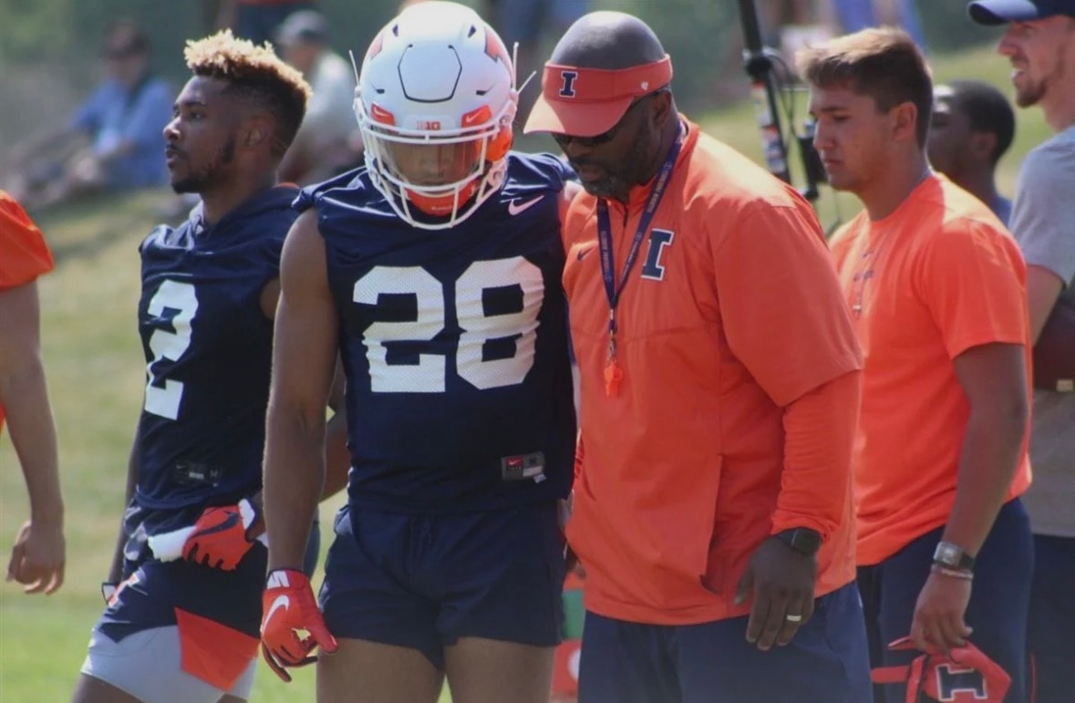 Coach Mike Bellamy coaching on the sideline